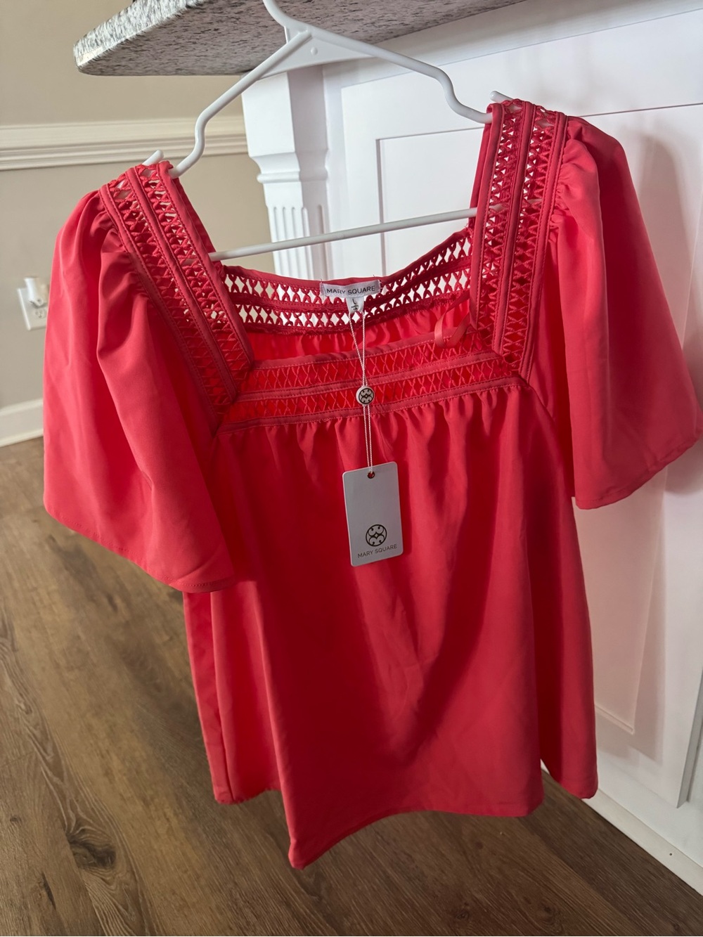 Mary Square women’s coral square neck top